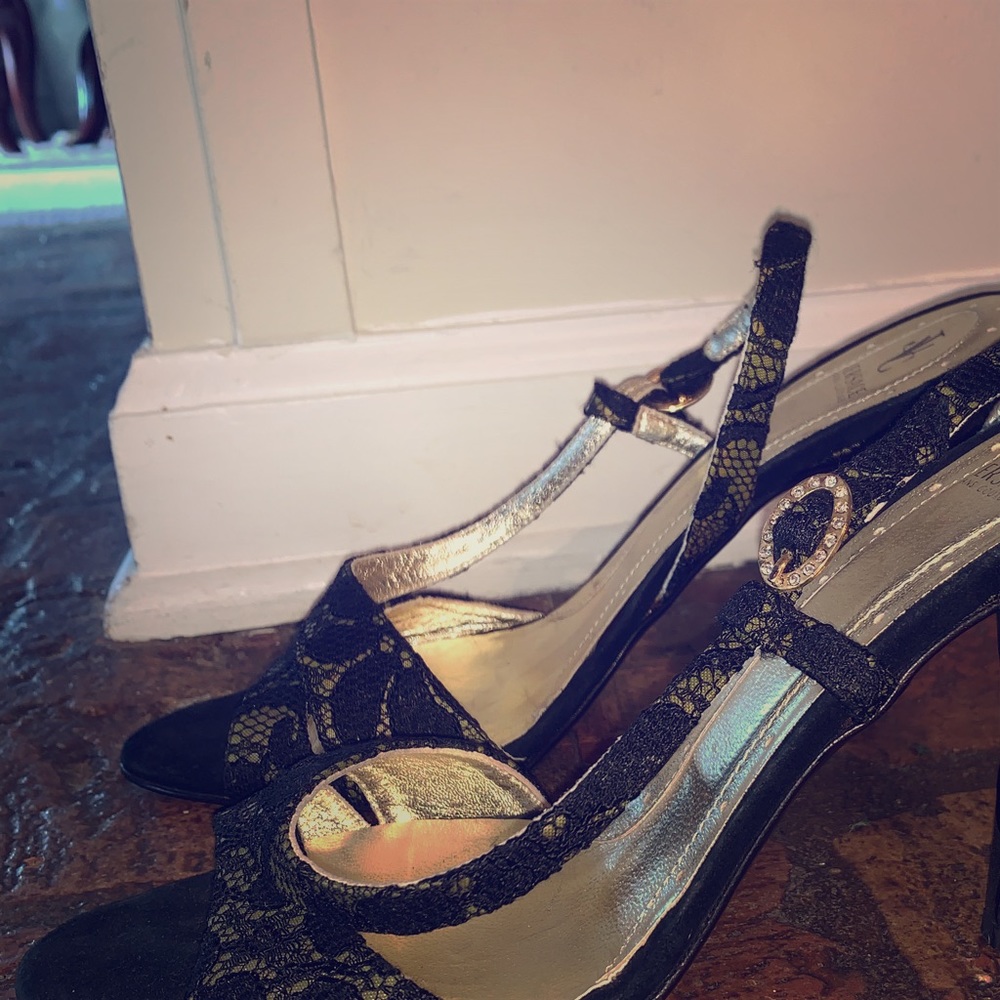 Versace sling back heel. Gold with black lace.